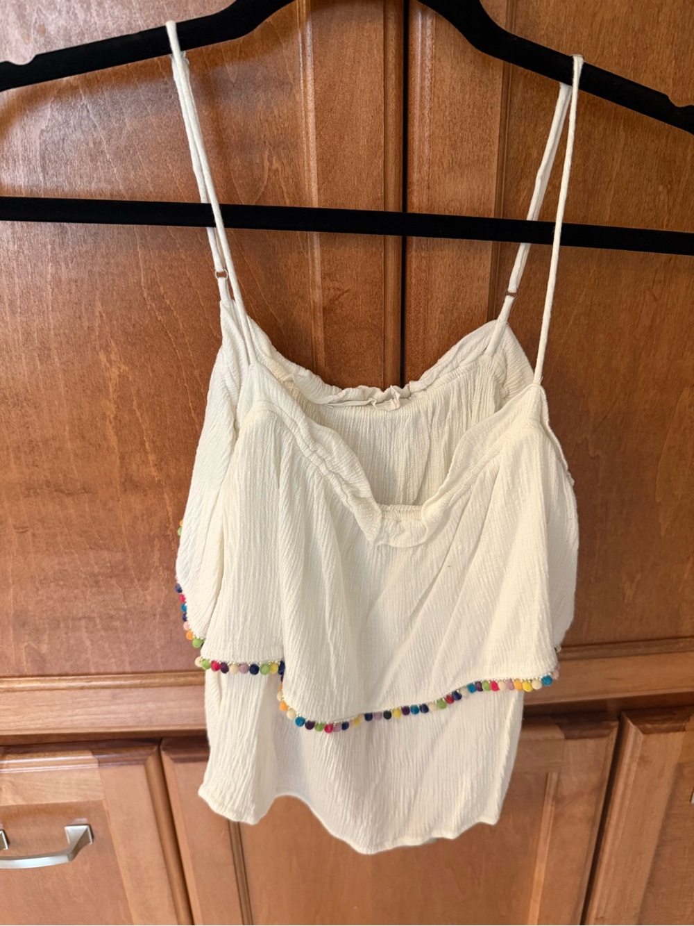 Lush Cream Spaghetti-Strap Cami with Multicolor Pom Poms